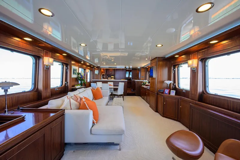 Slide: The Image of Luxurious interior of 1986 Jongert 85 yacht with elegant wood paneling and plush seating. - 8