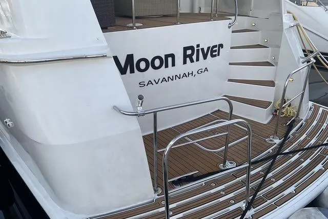 Slide: The Image of 1997 Hatteras 70 Sport Deck Motor Yacht, "Moon River," docked in Savannah, GA. - 4