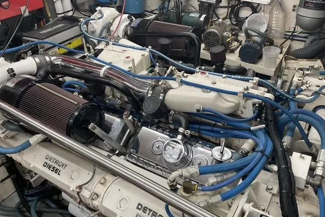 Slide: The Image of Engine room of a 1997 Hatteras 70 Sport Deck Motor Yacht with Detroit Diesel engines. - 44