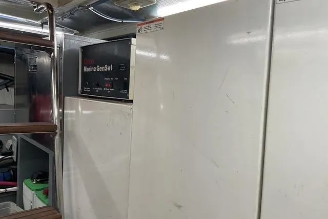 Slide: The Image of Engine room of 1997 Hatteras 70 Sport Deck Motor Yacht with Marine GenSet. - 54