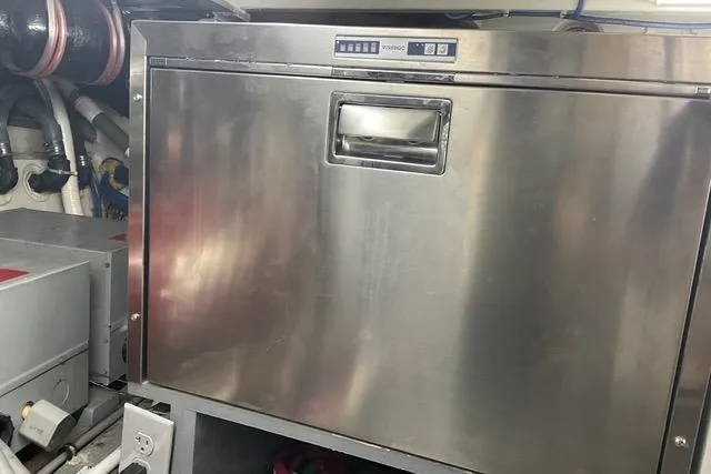 Slide: The Image of Stainless steel appliance in 1997 Hatteras 70 Sport Deck Motor Yacht engine room. - 57