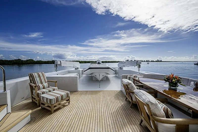 Slide: The Image of Luxurious deck of 1997 Delta 122 Tri-Deck Motor Yacht with elegant seating and ocean view. - 17