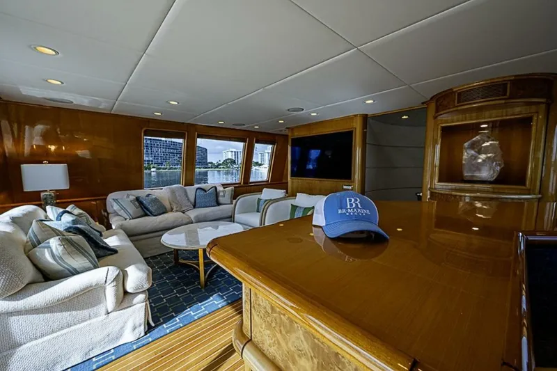 Slide: The Image of Luxurious interior of 1997 Delta 122 Tri-Deck Motor Yacht with elegant seating and decor. - 19