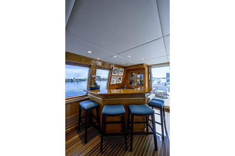 Slide: The Image of Luxurious bar area on 1997 Delta 122 Tri-Deck Motor Yacht with ocean view. - 34