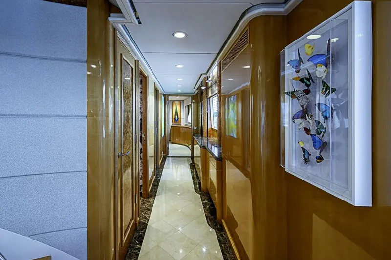 Slide: The Image of Luxurious hallway interior of 1997 Delta 122 Tri-Deck Motor Yacht with elegant decor. - 37