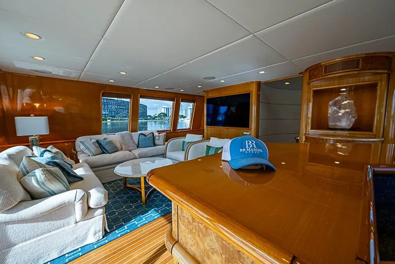 Slide: The Image of Luxurious 1997 Delta Marine yacht interior with plush seating and elegant wood finishes. - 18