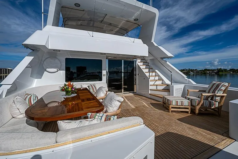 Slide: The Image of Luxurious 1997 Delta Marine yacht deck with elegant seating and ocean view. - 20
