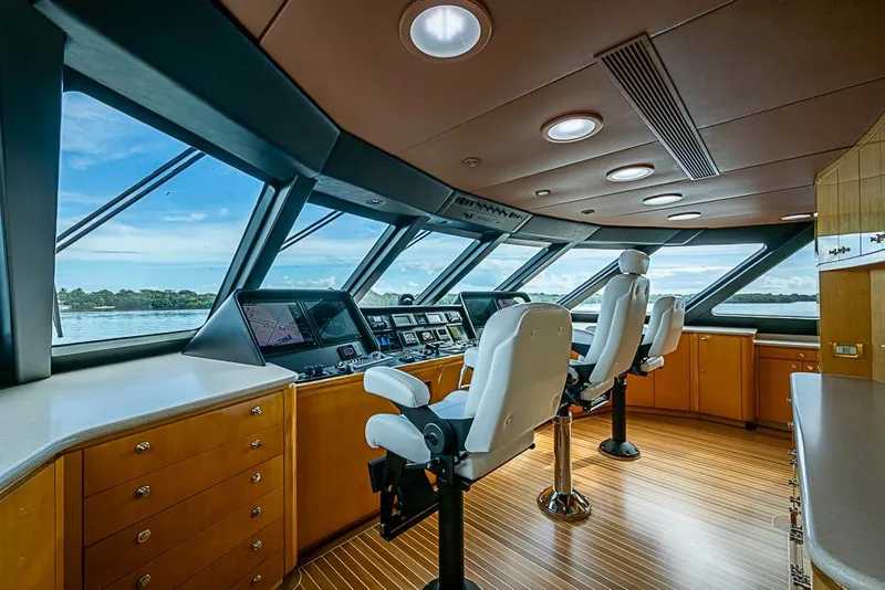 Slide: The Image of Luxurious 1997 Delta Marine yacht helm with panoramic windows and modern navigation equipment. - 53