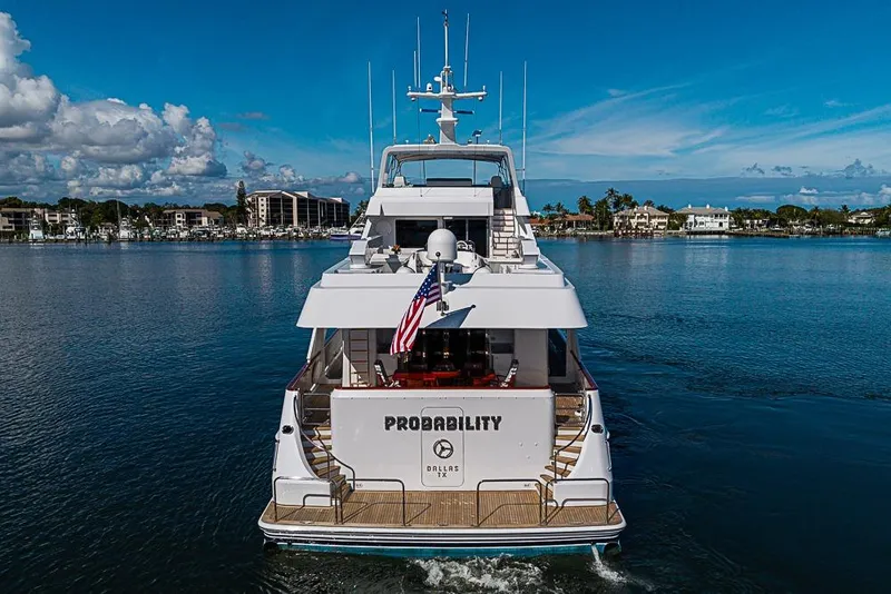 Slide: The Image of Luxury yacht "Probability" by Delta Marine, 1997, cruising on a serene waterway. - 7