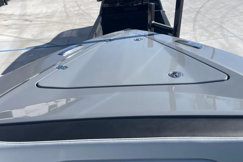 Slide: The Image of 2026 Nor- 390 Sport boat deck, sleek design, metallic finish, outdoor setting. - 22