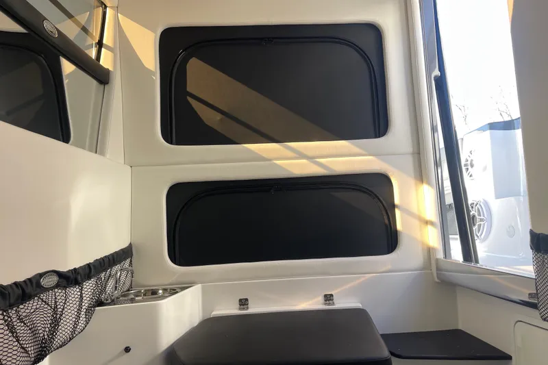 Slide: The Image of Interior of 2026 Nor- 390 Sport boat with seating and storage compartments. - 27