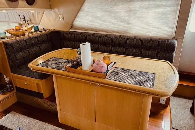 Slide: The Image of Luxurious 1996 Forbes Cooper pilot house interior with elegant dining area and stylish decor. - 11
