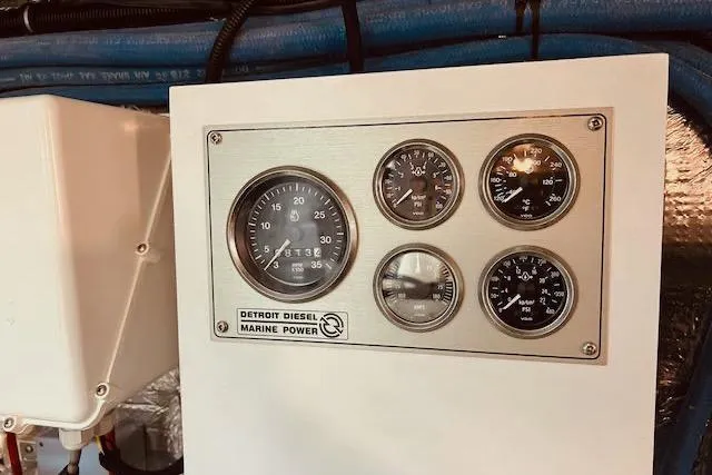 Slide: The Image of Instrument panel of a 1996 Forbes Cooper pilot house with Detroit Diesel Marine Power gauges. - 28