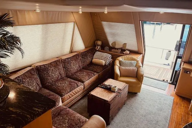 Slide: The Image of Luxurious 1996 Forbes Cooper pilot house interior with plush seating and elegant decor. - 8