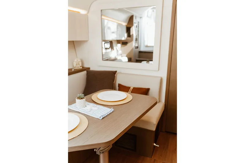 Slide: The Image of Interior of 2023 Beneteau Gran Turismo 41 yacht with elegant dining area. - 17