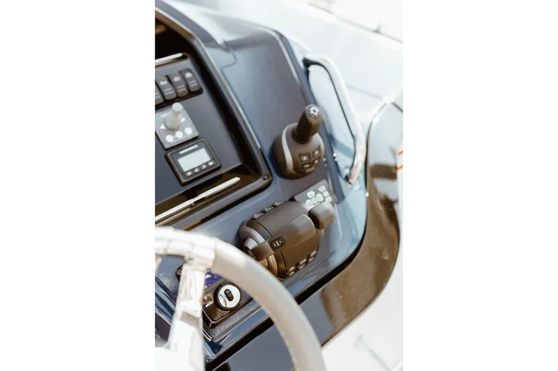 Slide: The Image of Control panel of 2023 Beneteau Gran Turismo 41 yacht, featuring modern navigation equipment. - 26