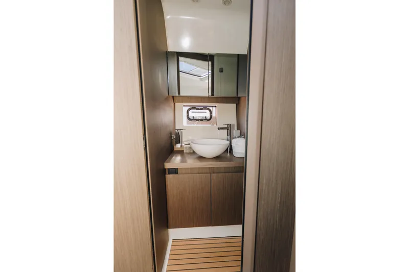 Slide: The Image of Modern bathroom interior on 2023 Beneteau Gran Turismo 41 yacht, featuring sleek design and fixtures. - 7