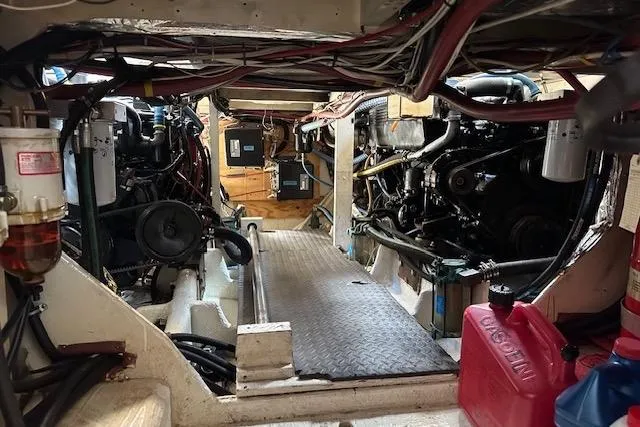 Slide: The Image of Electrical and mechanical components inside a 1985 Bayliner 4550 Motoryacht engine room. - 116