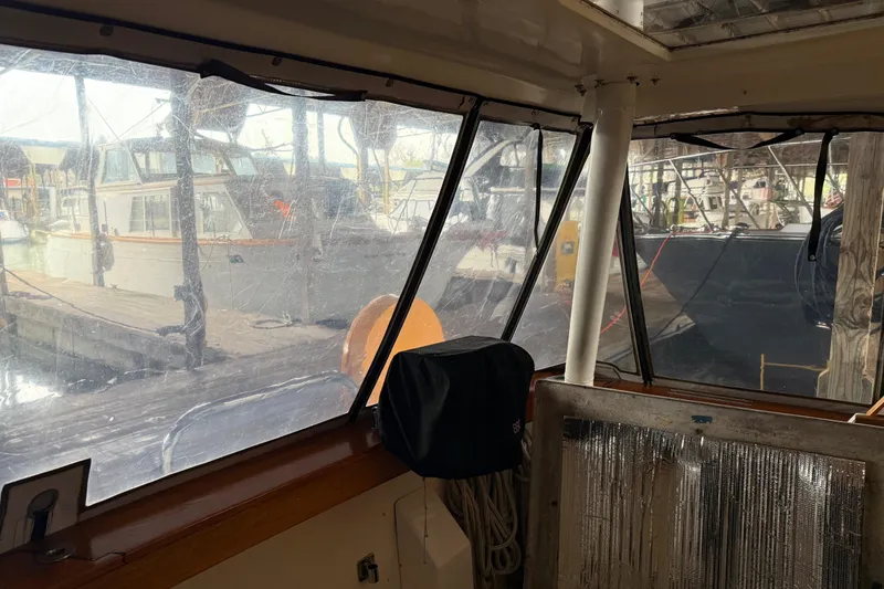 Slide: The Image of Engine compartment of 1985 Bayliner 4550 Motoryacht showing mechanical components and wiring. - 124