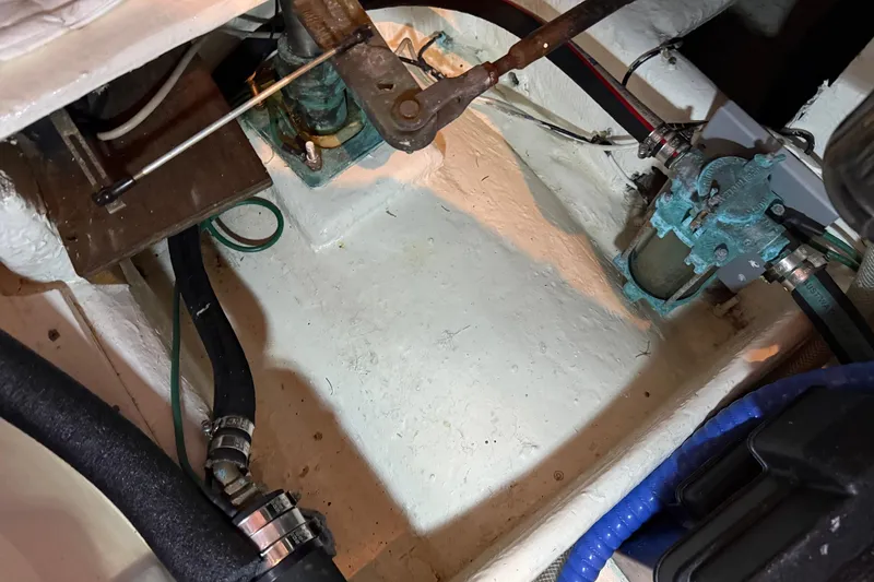 Slide: The Image of 1985 Bayliner 4550 Motoryacht docked, featuring a metal railing - 131