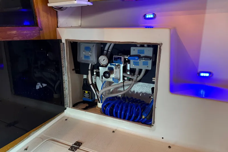 Slide: The Image of Engine compartment of 1985 Bayliner 4550 Motoryacht with Lugger engine and insulated walls. - 138