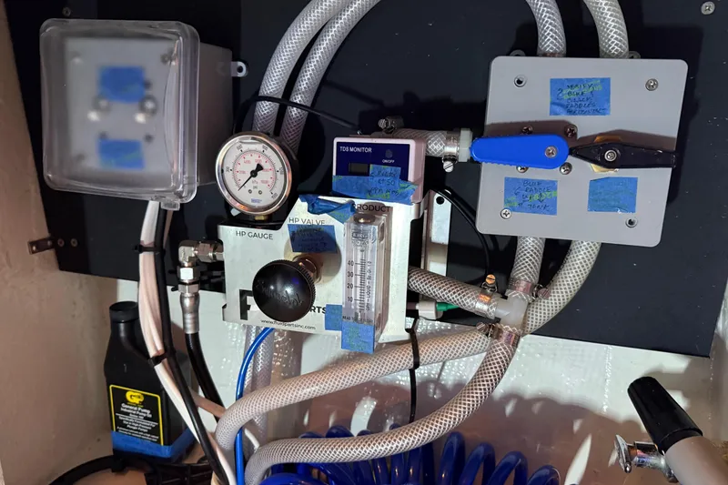 Slide: The Image of Engine room of 1985 Bayliner 4550 Motoryacht with visible machinery and components. - 139