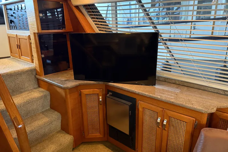 Slide: The Image of Interior of 1985 Bayliner 4550 Motoryacht with cozy seating and modern decor. - 17