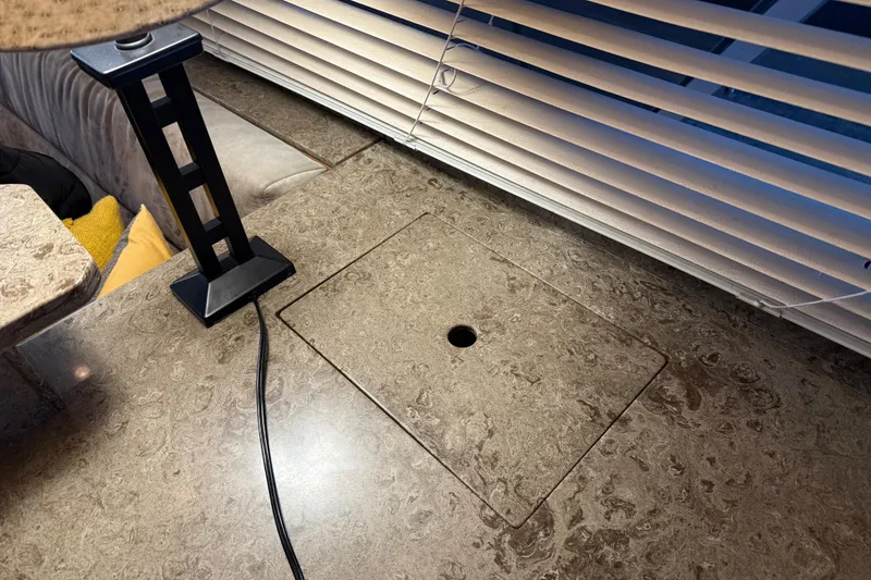 Slide: The Image of Luxurious kitchen area in a 1985 Bayliner 4550 Motoryacht with modern countertop and faucet. - 28