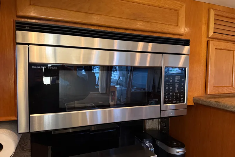 Slide: The Image of Galley kitchen in 1985 Bayliner 4550 Motoryacht with stainless steel appliances. - 32