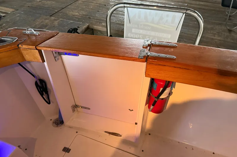 Slide: The Image of 1985 Bayliner 4550 Motoryacht on trailer at maritime service facility. - 4