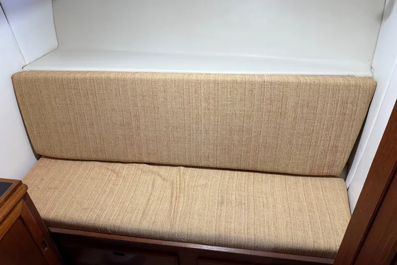 Slide: The Image of Interior of 1985 Bayliner 4550 Motoryacht with wooden desk and storage compartments. - 54