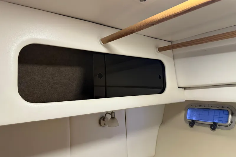 Slide: The Image of Beige cushioned seating inside 1985 Bayliner 4550 Motoryacht cabin. - 56