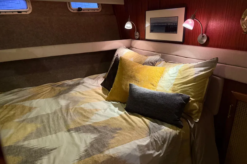 Slide: The Image of Interior of 1985 Bayliner 4550 Motoryacht with wooden paneling and modern lighting. - 59