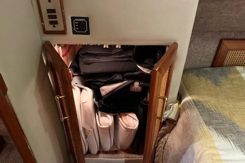 Slide: The Image of Interior of 1985 Bayliner 4550 Motoryacht with cozy bedroom and stylish decor. - 62