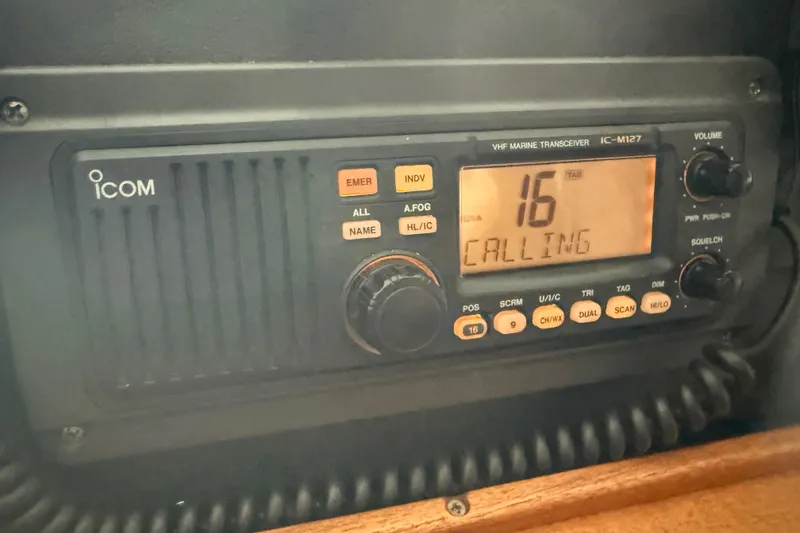 Slide: The Image of 1985 Bayliner 4550 Motoryacht helm with control panel and marine electronics. - 76