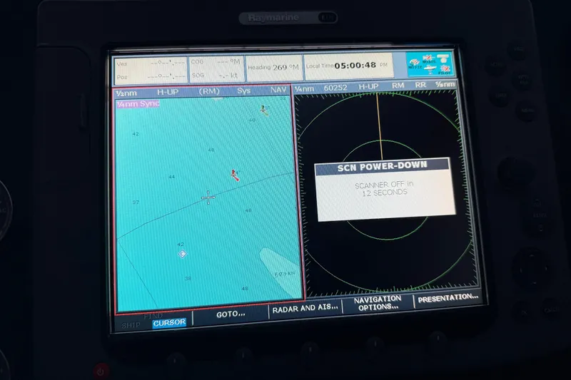 Slide: The Image of Sonar display on 1985 Bayliner 4550 Motoryacht showing depth and navigation data. - 92