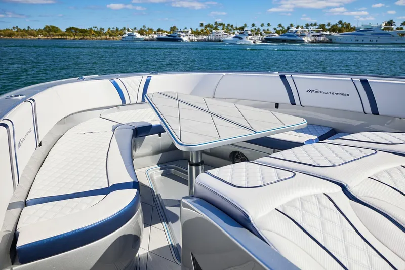 Slide: The Image of Luxurious seating area on a Midnight Express 43' Solstice boat, with ocean view. - 11