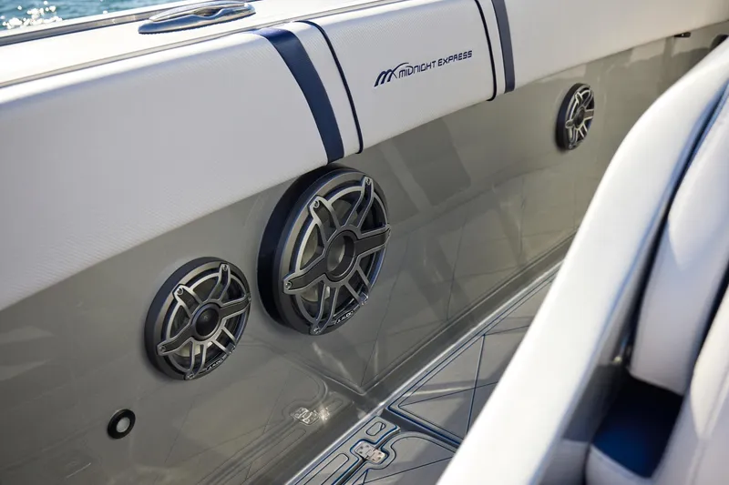 Slide: The Image of Midnight Express 43' Solstice boat interior with premium audio speakers. - 13