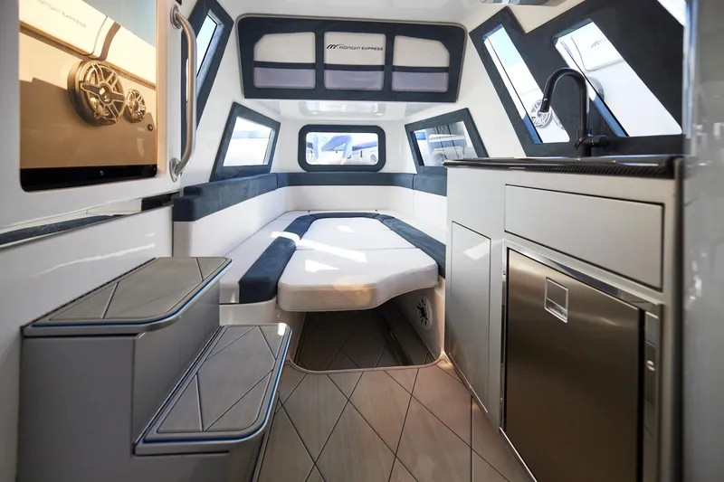 Slide: The Image of Luxurious interior of Midnight Express 43' Solstice boat with modern amenities and sleek design. - 19