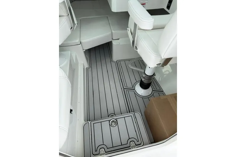 Slide: The Image of Interior of 2026 Parker 227 Explorer boat with sleek seating and modern flooring. - 12