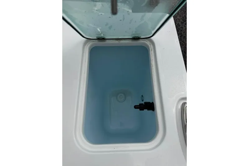 Slide: The Image of Livewell compartment in 2026 Parker 227 Explorer boat, filled with water. - 17