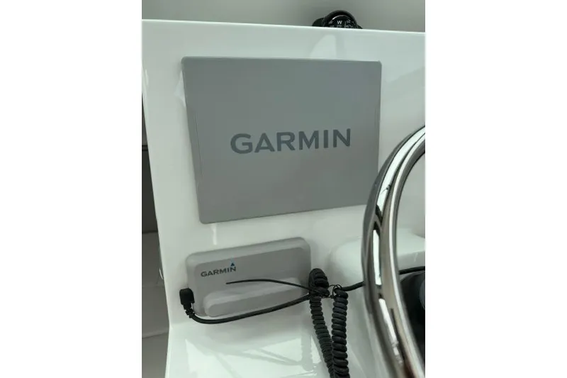 Slide: The Image of Garmin navigation system on 2026 Parker 227 Explorer boat dashboard. - 8