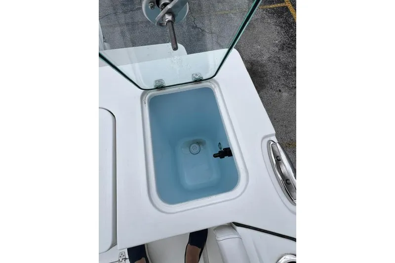 Slide: The Image of Livewell on 2026 Parker 247 Explorer boat, featuring a clean, white design. - 14