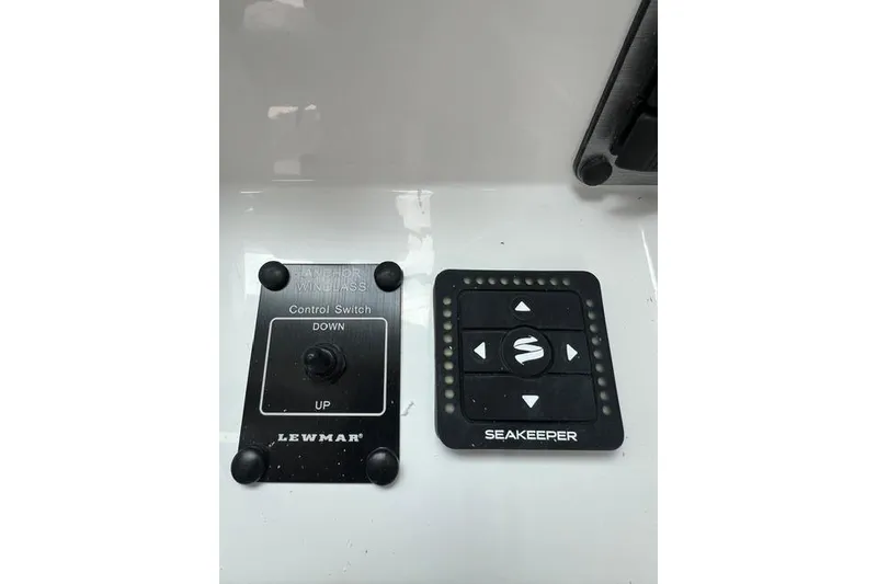 Slide: The Image of Control panels for Lewmar windlass and Seakeeper stabilizer on Parker 247 Explorer, 2026 model. - 8