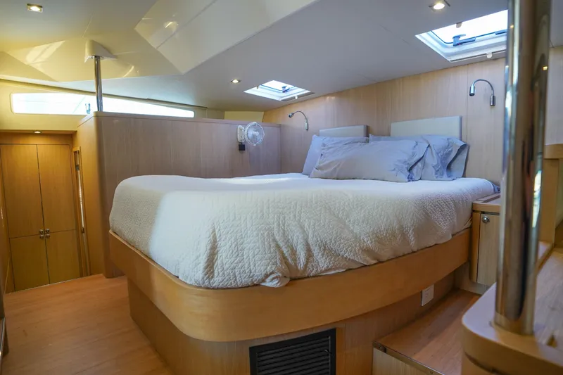 Slide: The Image of Luxurious bedroom interior of 2021 Aquila 44 Yacht with skylights and modern design. - 14