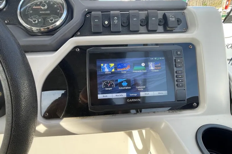 Slide: The Image of Dashboard of 2023 Godfrey Sweetwater 2086 SB with Garmin navigation system. - 11