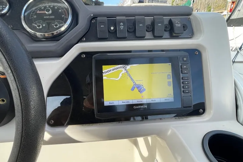 Slide: The Image of Dashboard of 2023 Godfrey Sweetwater 2086 SB with Garmin navigation display. - 12