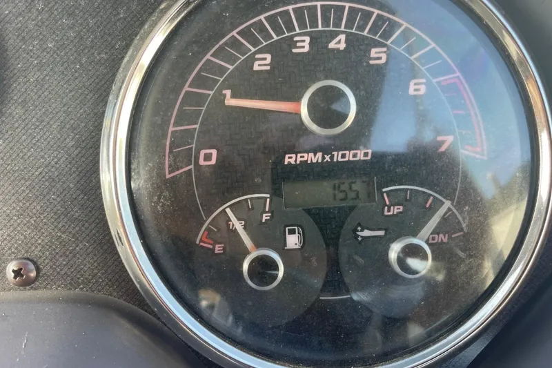 Slide: The Image of Close-up of 2023 Godfrey Sweetwater 2086 SB tachometer showing RPM and fuel gauge. - 14