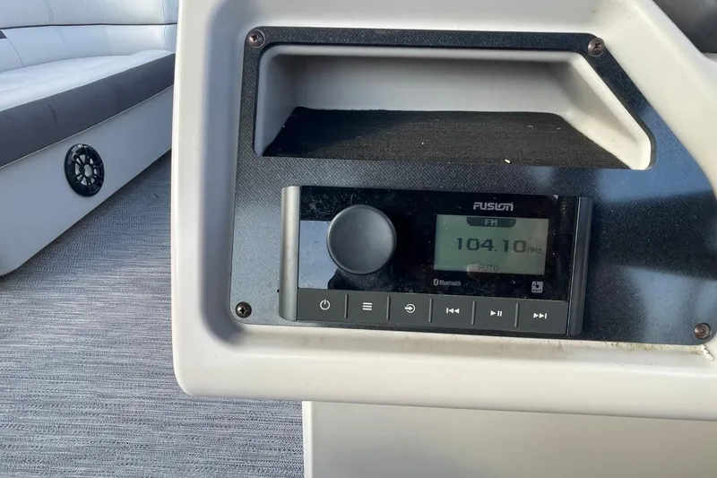 Slide: The Image of 2023 Godfrey Sweetwater 2086 SB boat interior with Fusion radio system. - 17