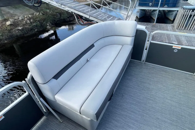 Slide: The Image of 2023 Godfrey Sweetwater 2086 SB pontoon boat with sleek gray seating and spacious deck. - 18